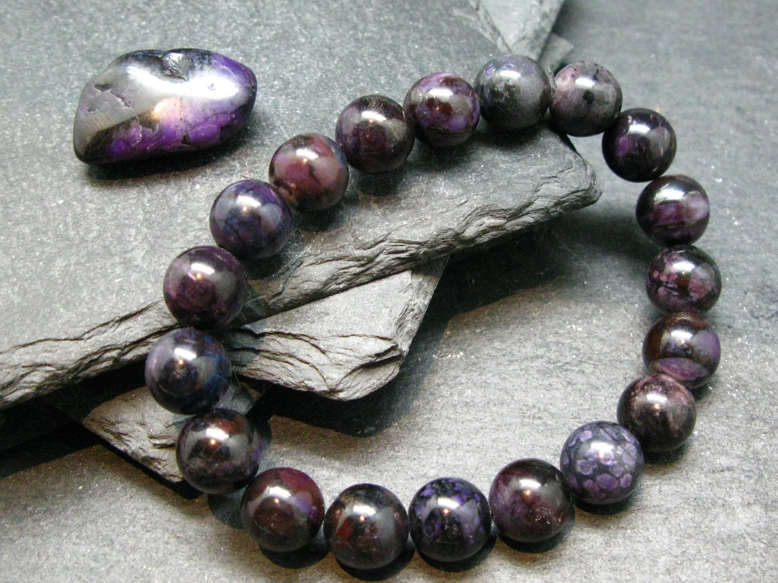 Sugilite Genuine Bracelet ~ 7 Inches ~ 10mm Round Beads Sugilite Genuine Bracelet ~ 7 Inches ~ 10mm Round Beads