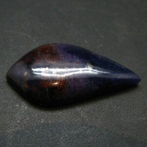 Rare Bustamite And Sugilite Cabochon From South Africa - 0.9" - 3.82 Grams Rare Bustamite And Sugilite Cabochon From South Africa - 0.9" - 3.82 Grams