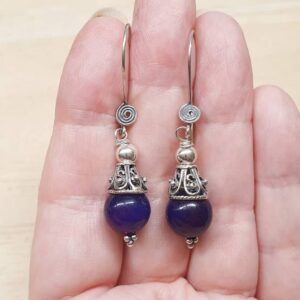 Rare Sugilite cone earrings. Crystal Reiki jewelry uk. Wire wrap earrings. Bali silver dangle drop earrings. 10mm stones Rare Sugilite cone earrings. Crystal Reiki jewelry uk. Wire wrap earrings. Bali silver dangle drop earrings. 10mm stones