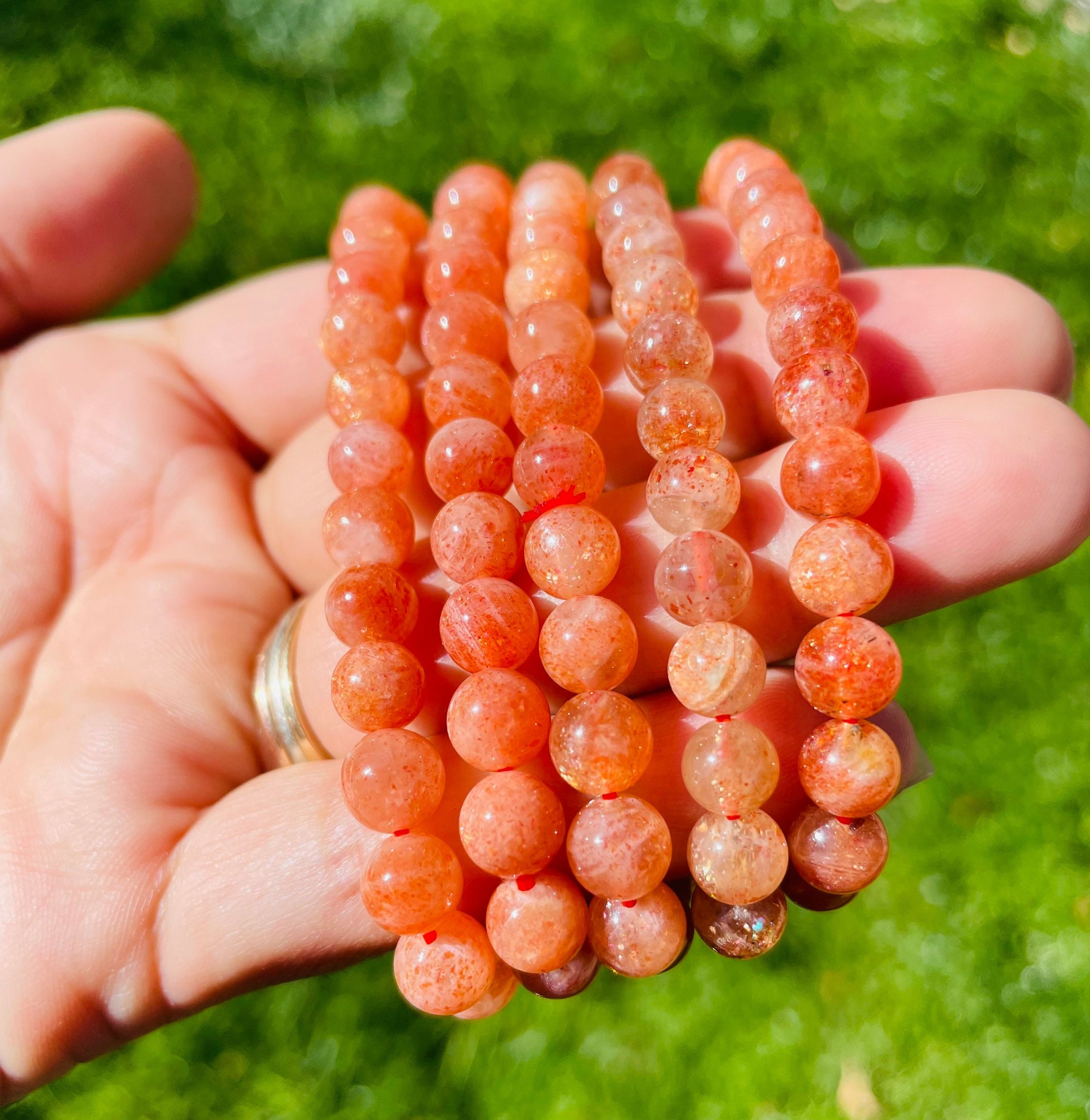 Arusha Sunstone Bracelet: Flashy Glitter Orange Crystal, Xs Round Bead Arusha Sunstone Bracelet: Flashy Glitter Orange Crystal, Xs Round Bead