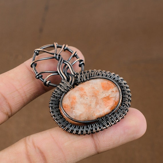 Handmade Copper Wire Wrapped Sunstone Pendant: Designer Jewelry