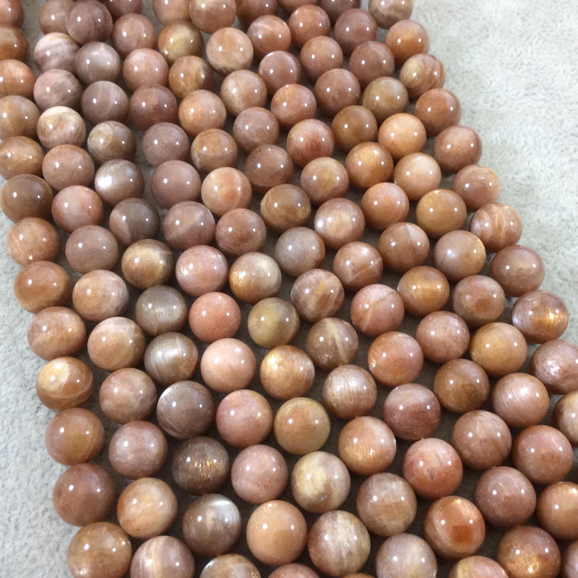 Peach Sunstone Beads: 10mm Aaa Glossy Round Gemstone Strand Peach Sunstone Beads: 10mm Aaa Glossy Round Gemstone Strand