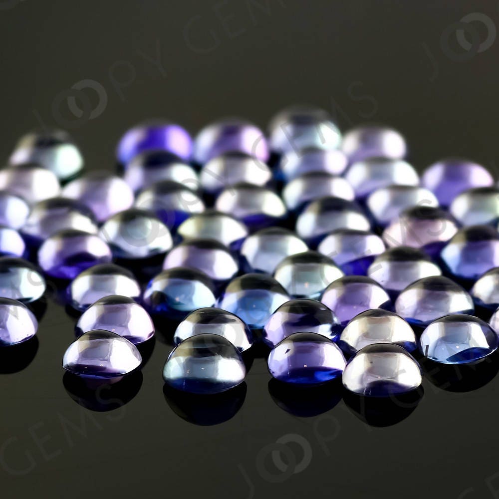 Tanzanite Cabochon 4mm Round - Per Stone Tanzanite Cabochon 4mm Round - Per Stone