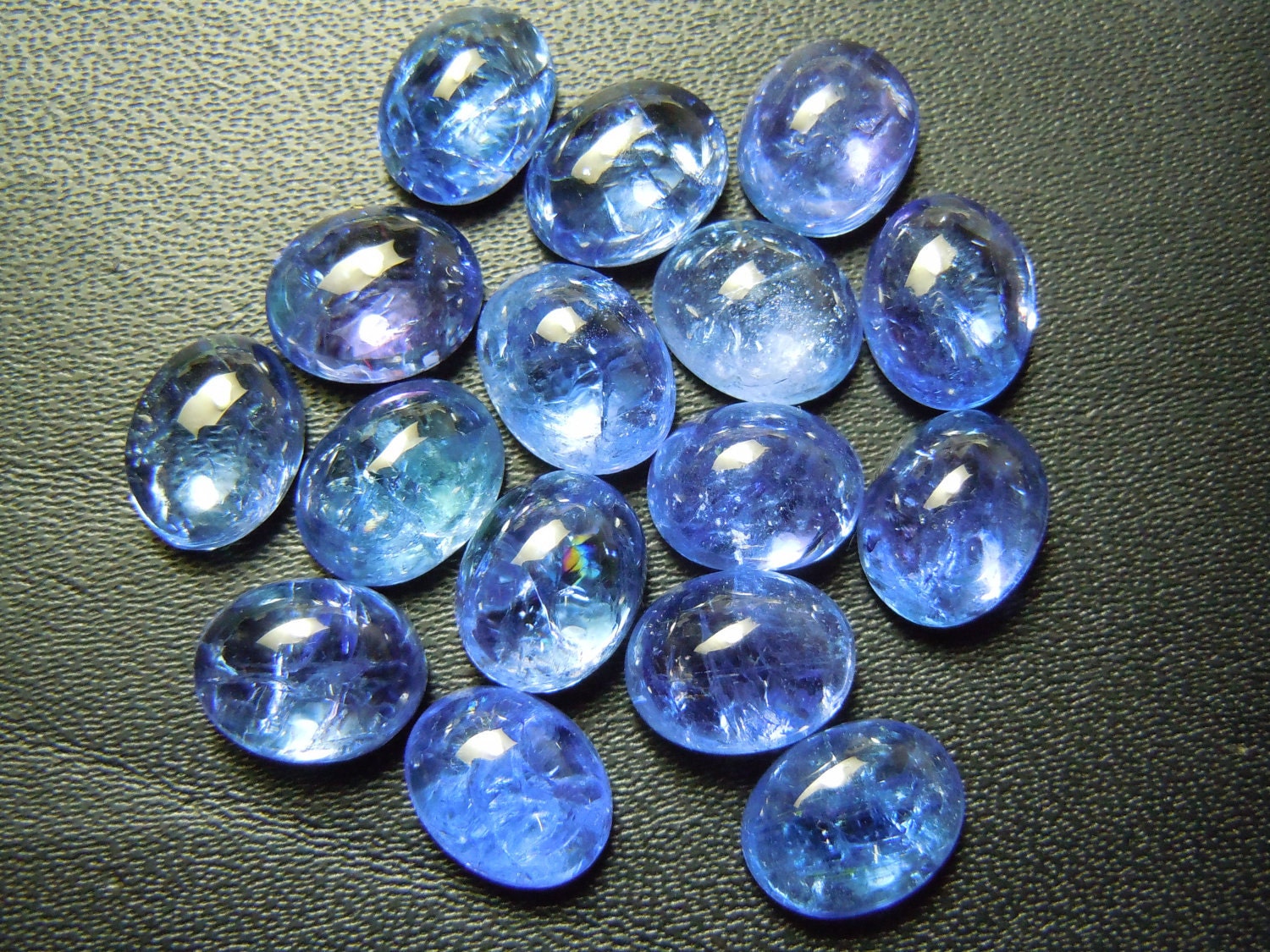 Tanzanite Cabochon Gemstones, 7x9mm Oval Deep Blue, Jewelry Making Supplies (10pcs) Tanzanite Cabochon Gemstones, 7x9mm Oval Deep Blue, Jewelry Making Supplies (10pcs)