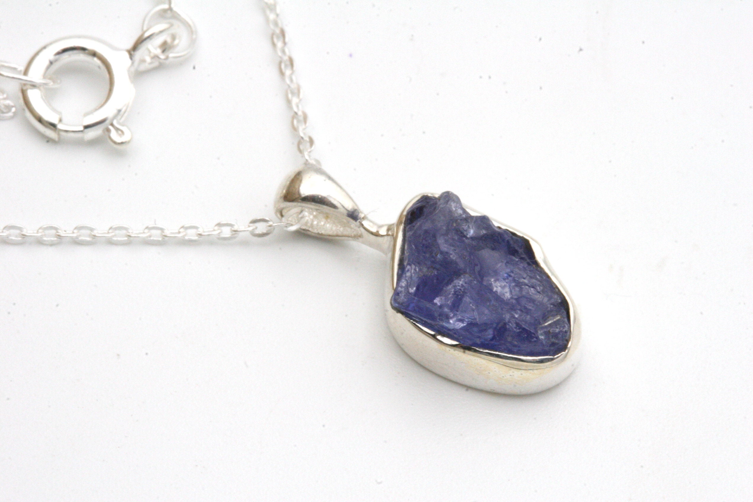 Raw Tanzanite Necklace: Sterling Silver Bezel, Adjustable Chain Raw Tanzanite Necklace: Sterling Silver Bezel, Adjustable Chain
