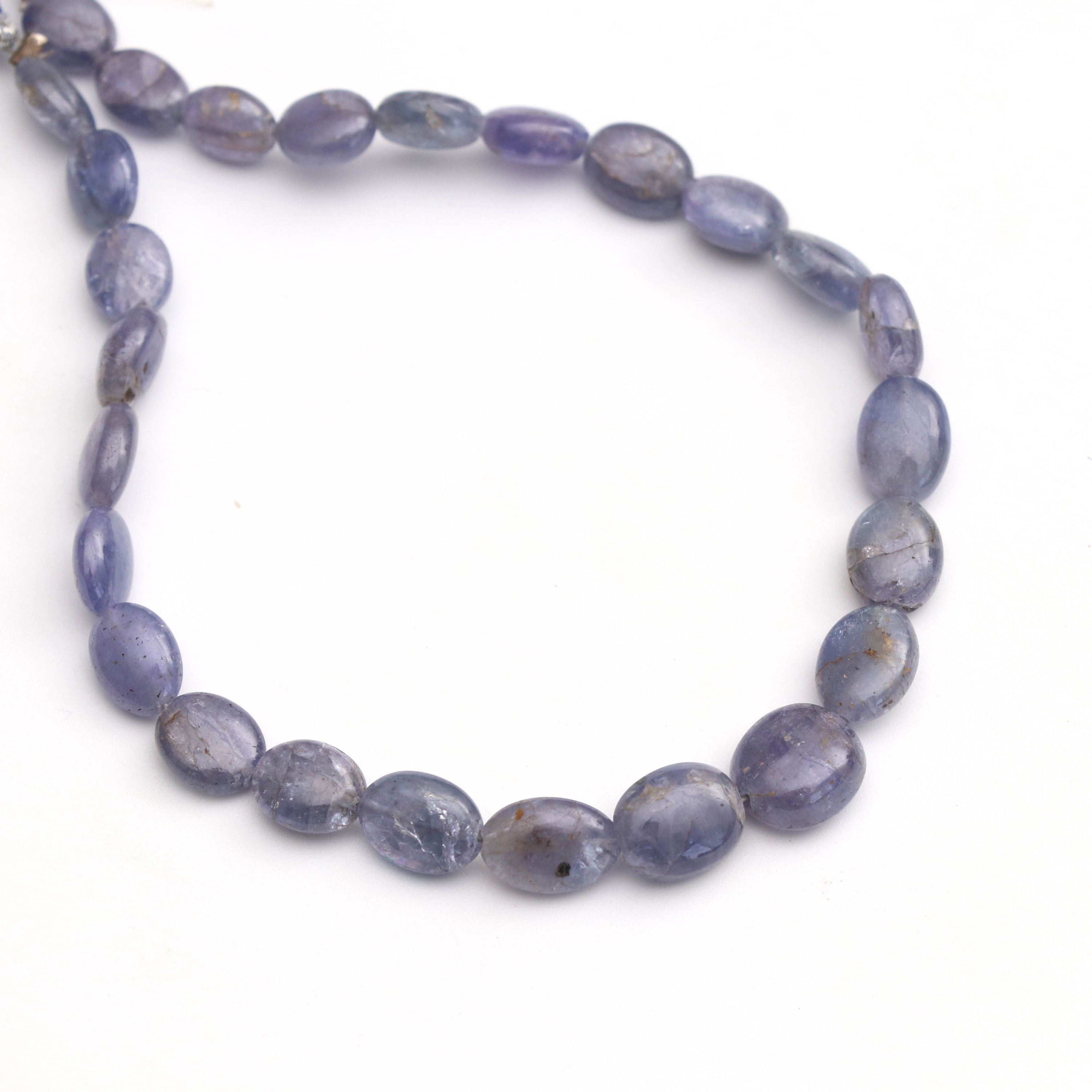 Natural Tanzanite Smooth Oval Beads, Tanzanite Oval, 6x7 Mm To 7.5x9 Mm - Tanzanite - Gem Quality , 8 Inch Full Strand, Price Per Strand Natural Tanzanite Smooth Oval Beads, Tanzanite Oval, 6x7 Mm To 7.5x9 Mm - Tanzanite - Gem Quality , 8 Inch Full Strand, Price Per Strand