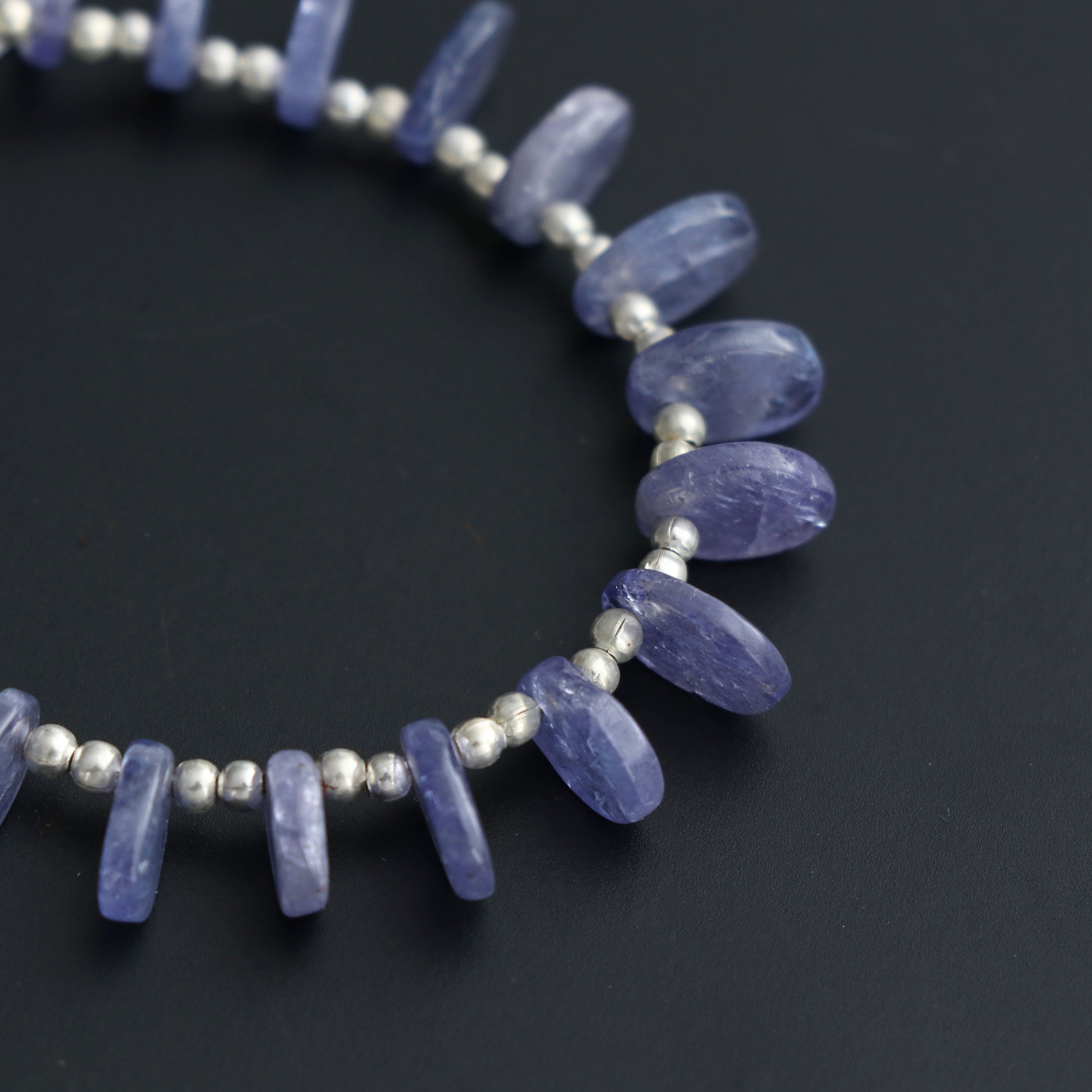 Natural Tanzanite Smooth Flat Oval Beads, 5x6 Mm To 8x9.5 Mm, Tanzanite Jewelry Making Beads, 5.5 Inches Full Strand, Price Per Strand Natural Tanzanite Smooth Flat Oval Beads, 5x6 Mm To 8x9.5 Mm, Tanzanite Jewelry Making Beads, 5.5 Inches Full Strand, Price Per Strand