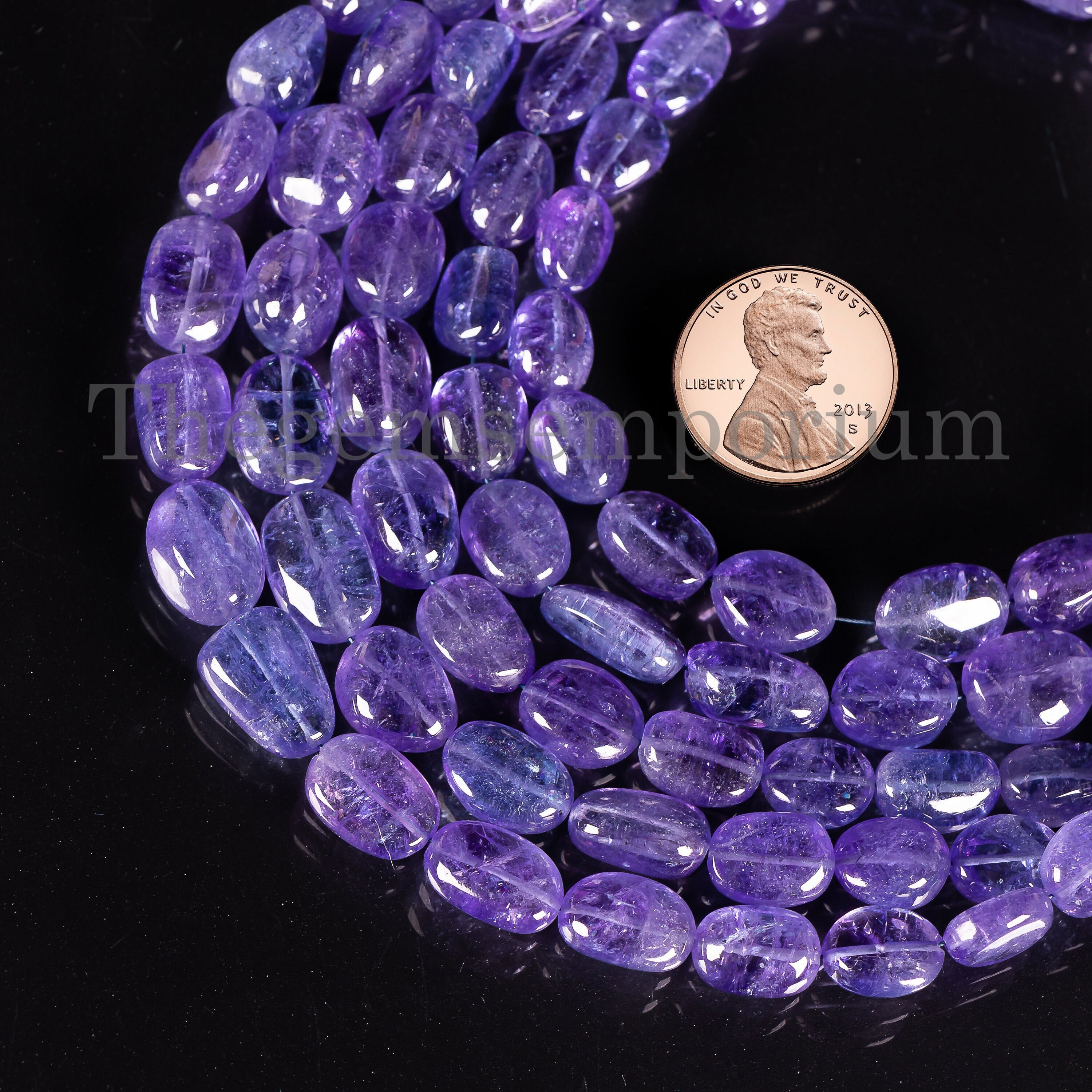 Top Quality Tanzanite Smooth Oval Briolette Beads (6x7.5-8.5x12.5mm)