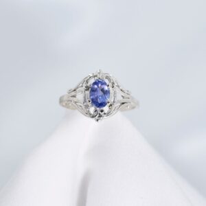 Tanzanite Ring, December Birthstone, Genuine Gemstone, 6x4mm Oval 1/2ct +, Set In 925 Sterling Silver Scrolled Solitaire Ring