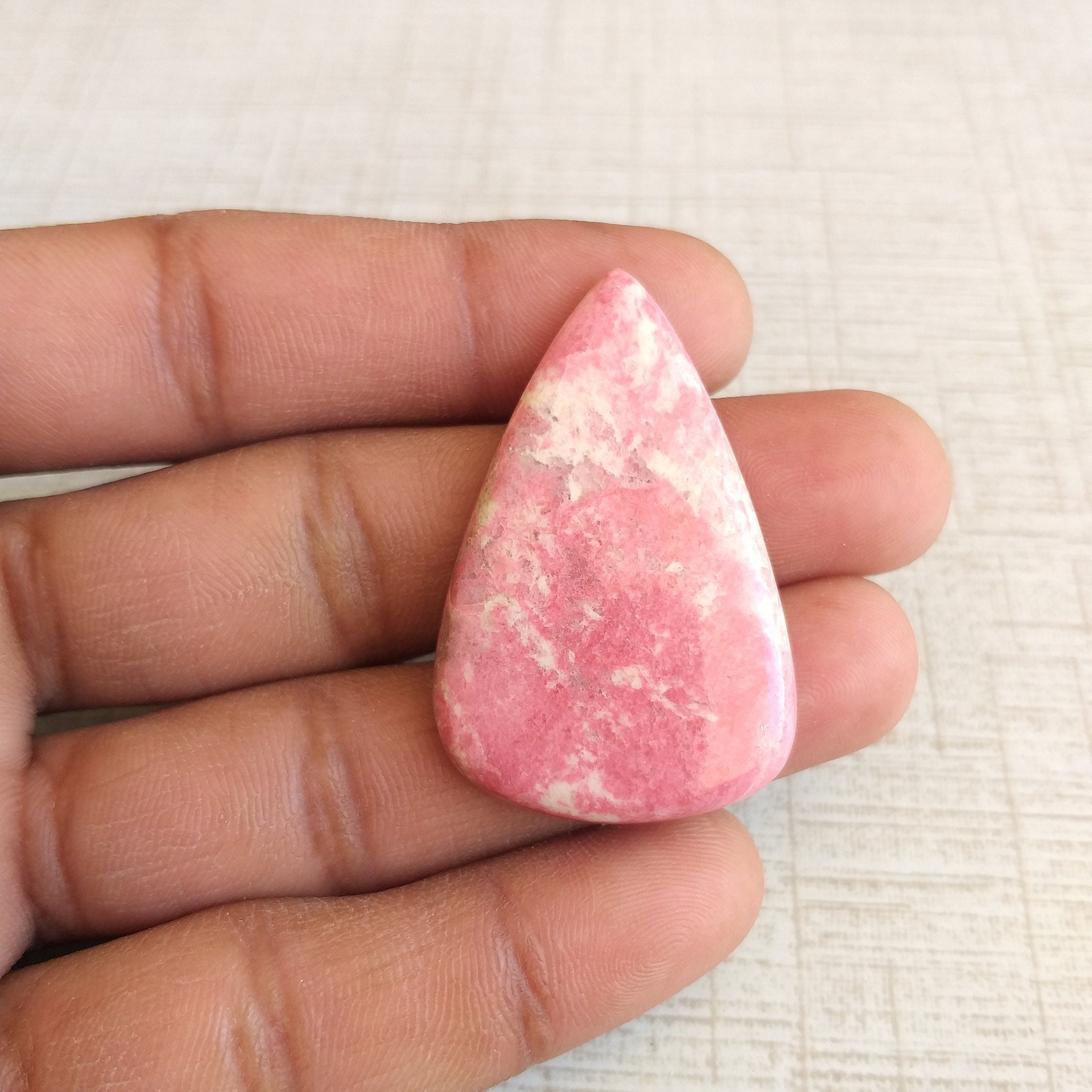 Thulite Stone Cabochon: 58.6 Carat Pear Shape, Natural Gemstone (44x28x6 Mm