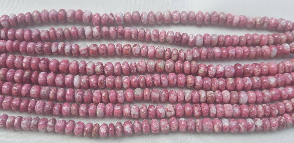Thulite Beads: Pink Rondelle Bati Shape, 7-9mm (uniform Size), 10" Strand Thulite Beads: Pink Rondelle Bati Shape, 7-9mm (uniform Size), 10" Strand
