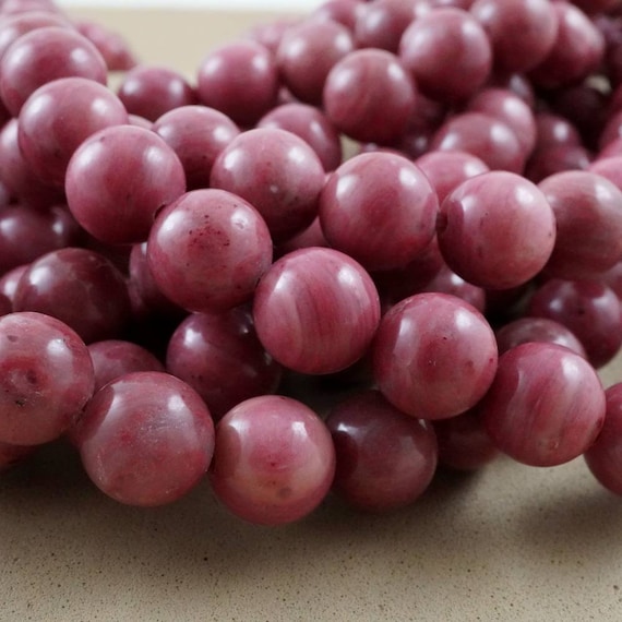 Thulite Beads (round)(smooth)(4mm)(6mm)(8mm)(10mm)(12mm)(16"strand) Thulite Beads (round)(smooth)(4mm)(6mm)(8mm)(10mm)(12mm)(16"strand)