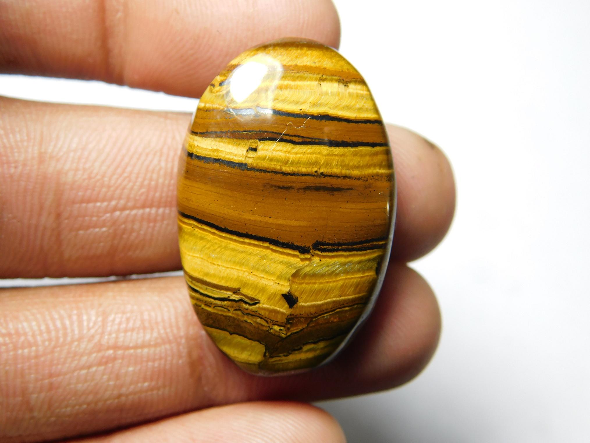 Handmade Tiger Eye Cabochon Gemstone (32x20 Mm, 41ct) Handmade Tiger Eye Cabochon Gemstone (32x20 Mm, 41ct)