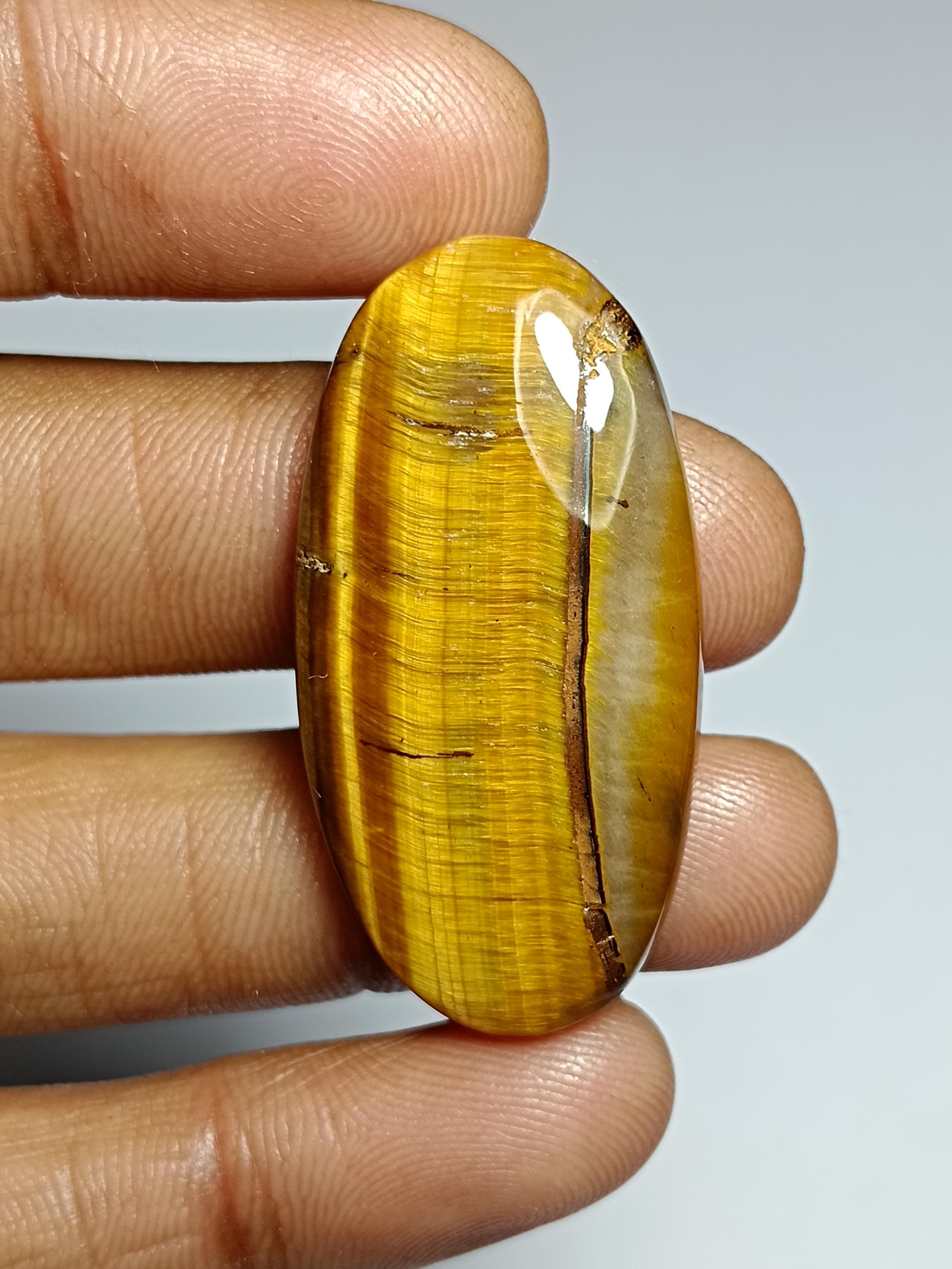 Handmade Tiger Eye Cabochon: Semi Precious Loose Stone (41ct, 39x19 Mm) Handmade Tiger Eye Cabochon: Semi Precious Loose Stone (41ct, 39x19 Mm)