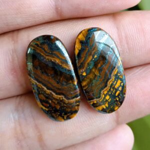 Matched Iron Tiger's Eye Cabochons, Oval Flat Back Gemstones (24x12x4 MM) Matched Iron Tiger's Eye Cabochons, Oval Flat Back Gemstones (24x12x4 MM)
