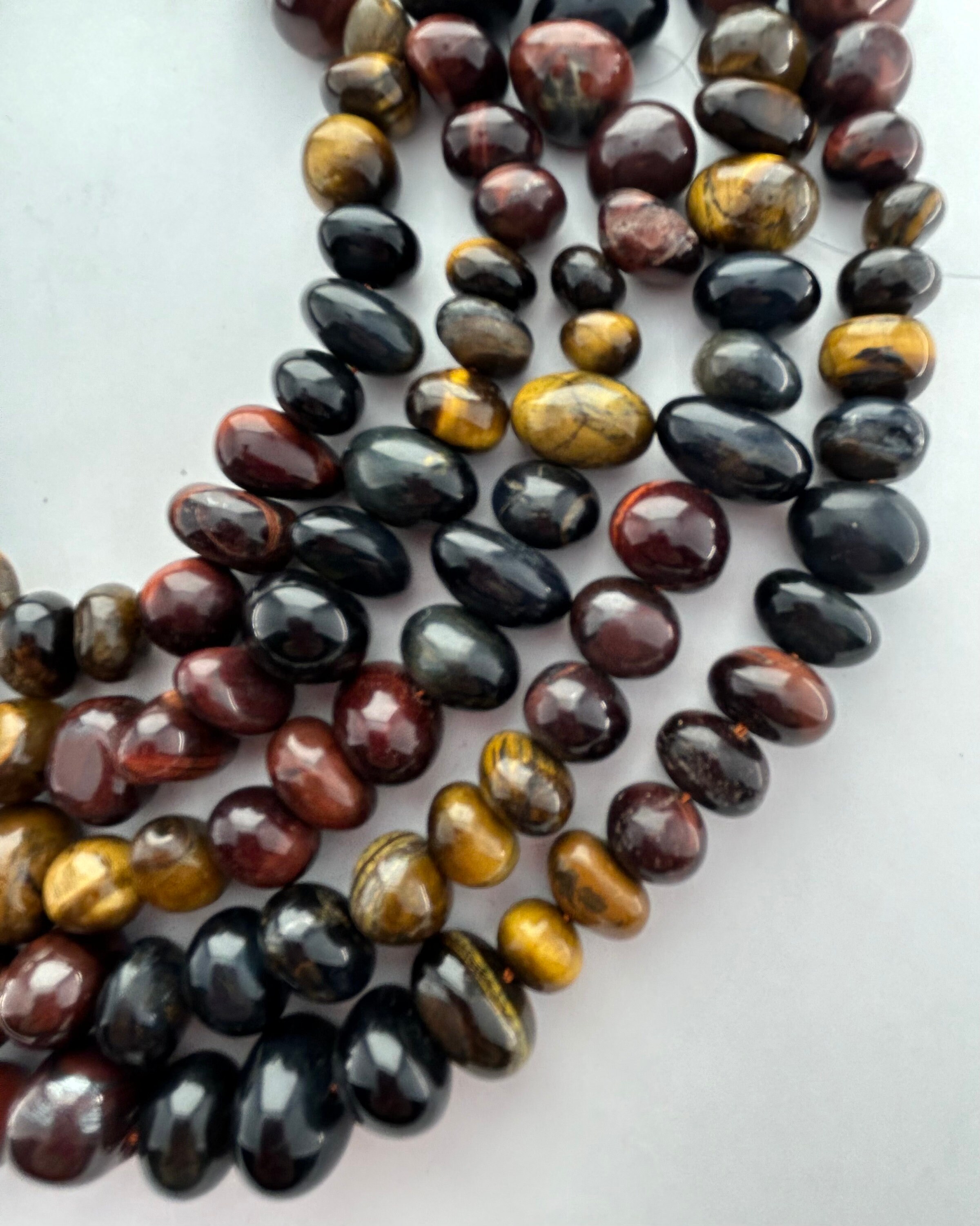 8-12mm Nugget Mixed Tiger Eye Gemstone Beads. 15” Strand Of Free Form Tiger Eye Beads. Brown, Red And Blue Mix. 8-12mm Nugget Mixed Tiger Eye Gemstone Beads. 15” Strand Of Free Form Tiger Eye Beads. Brown, Red And Blue Mix.