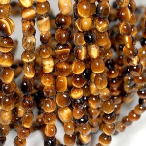 Cognac Tiger Eye Gemstone Yellow 8x6-7x5MM Pebble Nugget Loose Beads 15.5 inch Full Strand (90191777-B66) Cognac Tiger Eye Gemstone Yellow 8x6-7x5MM Pebble Nugget Loose Beads 15.5 inch Full Strand (90191777-B66)