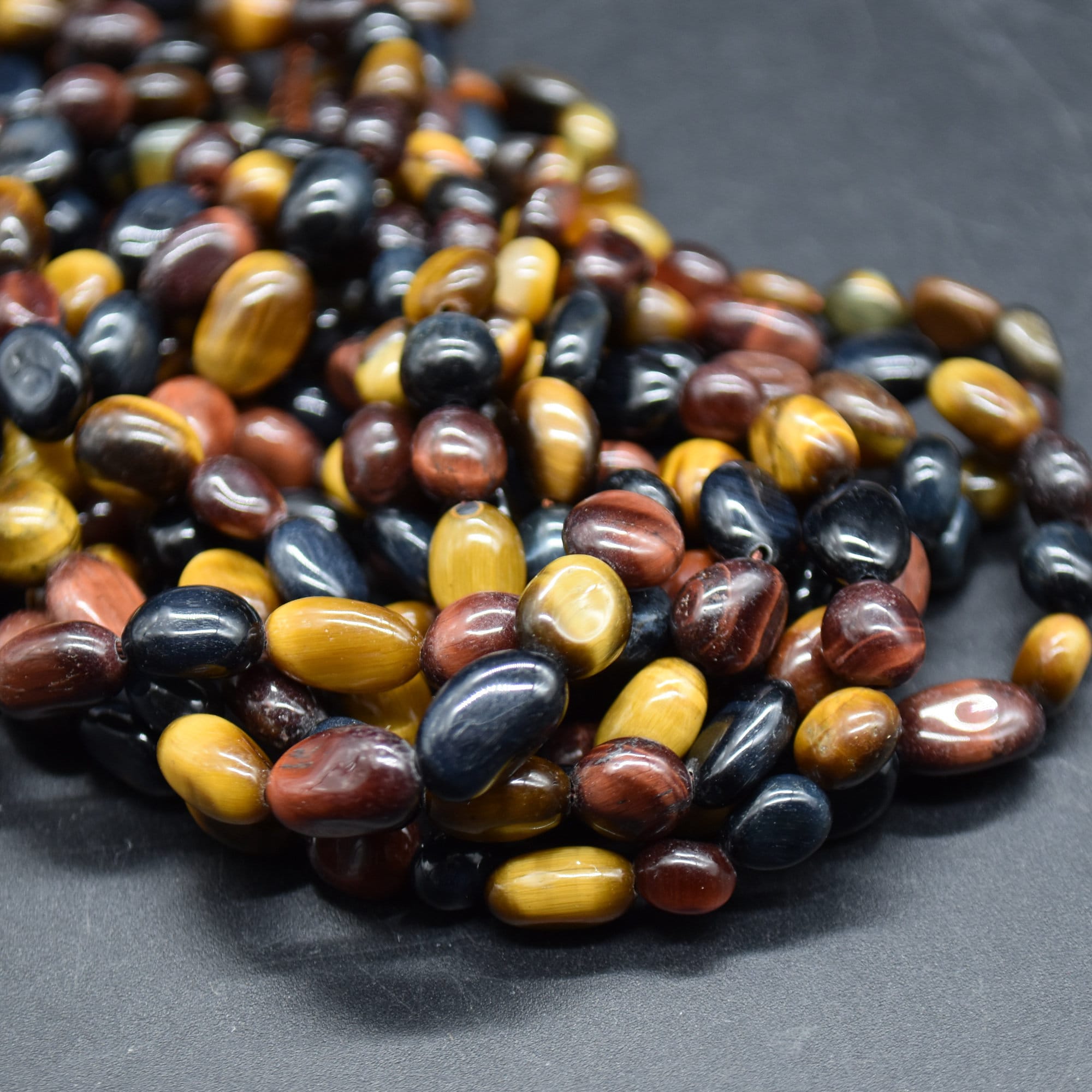 Multi Colour Tiger Eye Gemstone Pebble Tumblestone Nugget Beads - 7mm - 10mm - 15" Strand Multi Colour Tiger Eye Gemstone Pebble Tumblestone Nugget Beads - 7mm - 10mm - 15" Strand