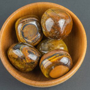 Natural Tiger Eye Tiger's Eye Tigers Eye Tumbled Nuggets- 100 grams-3.5 ounces - .5 inch-1.5 inch Size- Roughly 7 pcs per bag