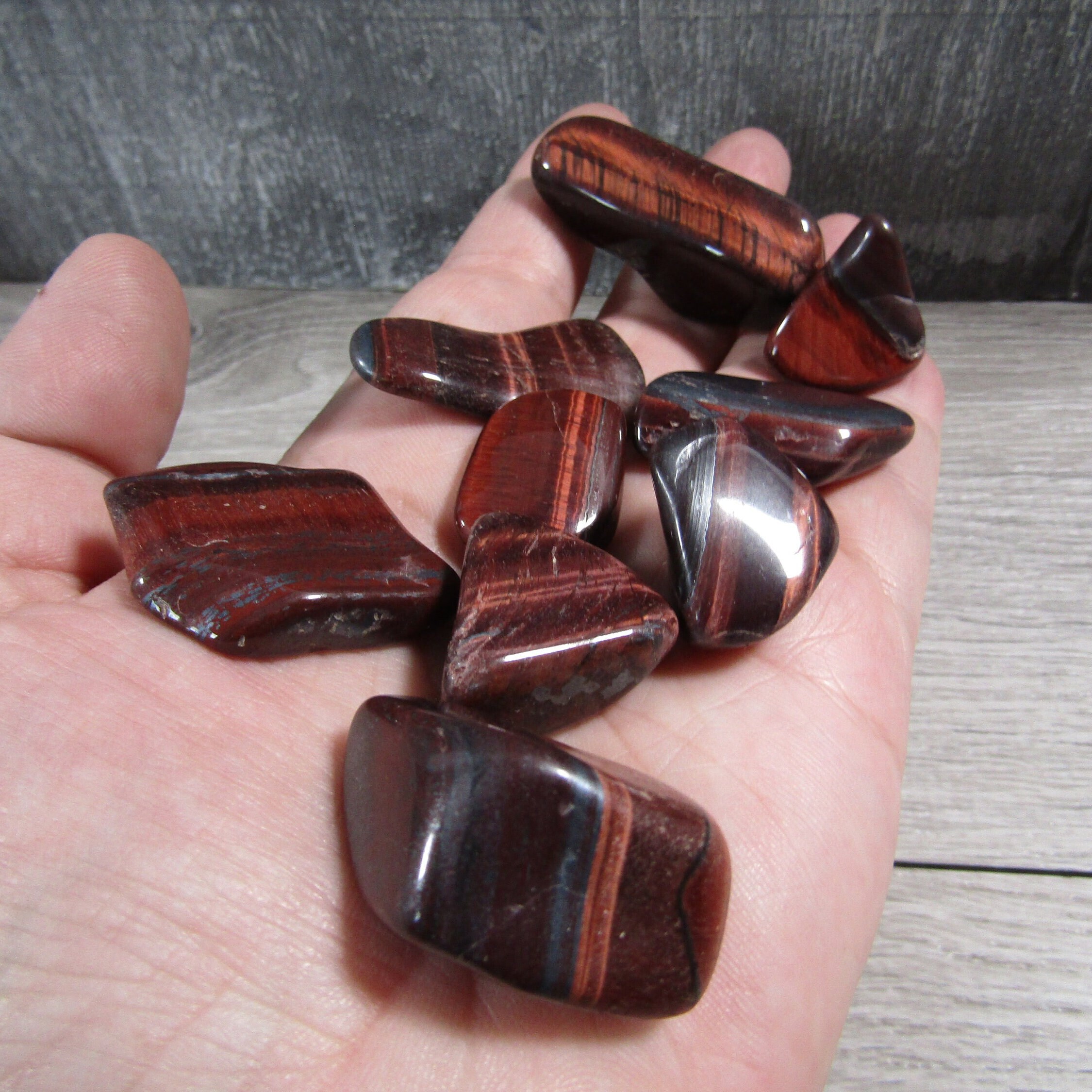 Red Tiger's Eye // Tumbled Stone // About .75 - 1 Inch Each Red Tiger's Eye // Tumbled Stone // About .75 - 1 Inch Each