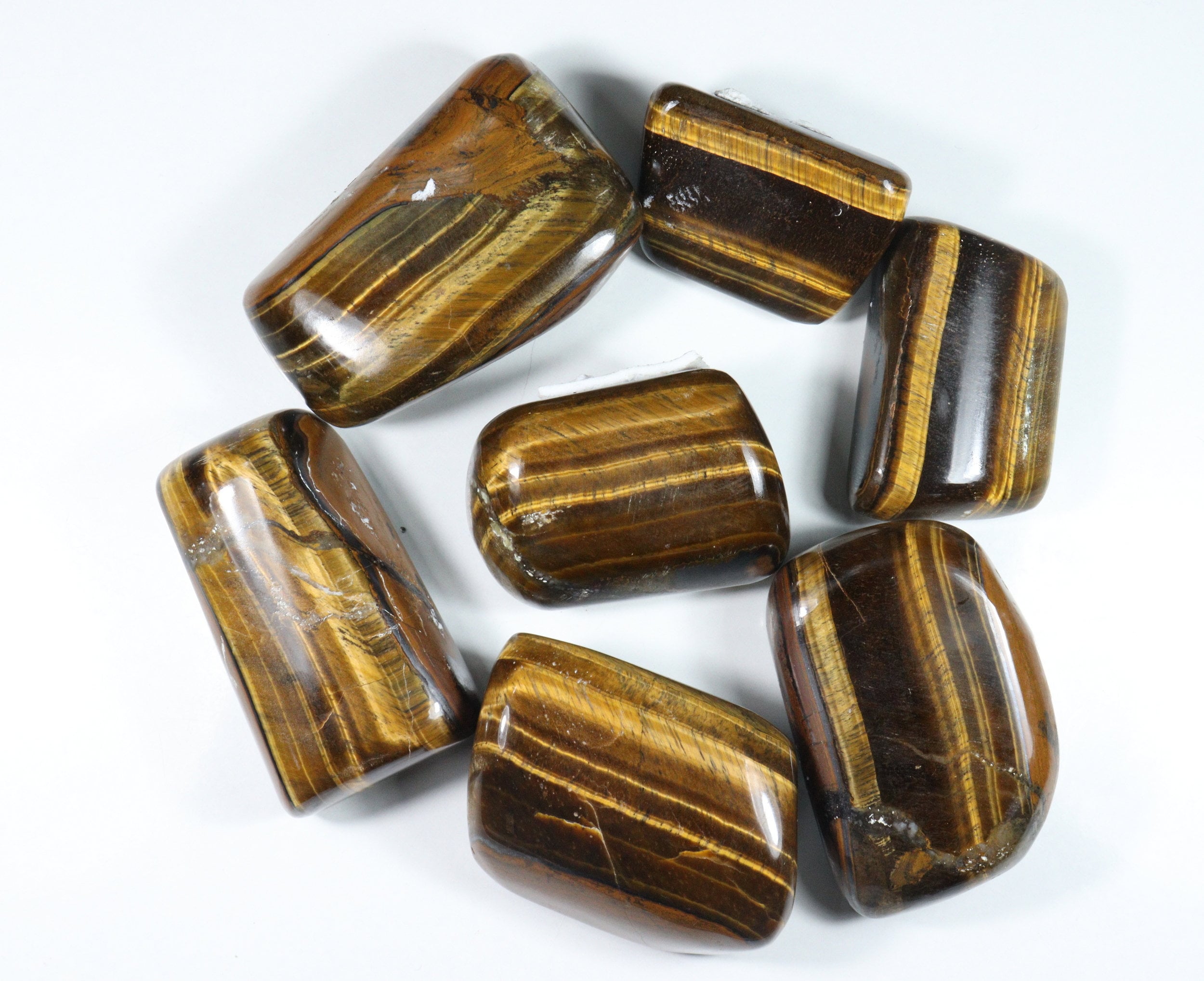 Tigers Eye Tumbled Stones: Grade A Polished Gemstone Tigers Eye Tumbled Stones: Grade A Polished Gemstone
