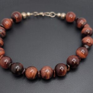 Tiger Iron is a special combination of stones of banded layers of Hematite, Red Jasper, and Tiger Eye giving this piece rare beauty.