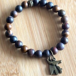 Matte Tiger Iron Anubis charm bracelet, 8mm beaded gemstone elastic bracelet, approx. 7 inches.