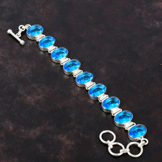 Faceted Swiss Blue Topaz Bracelet: 925 Sterling Silver Adjustable Chain Faceted Swiss Blue Topaz Bracelet: 925 Sterling Silver Adjustable Chain