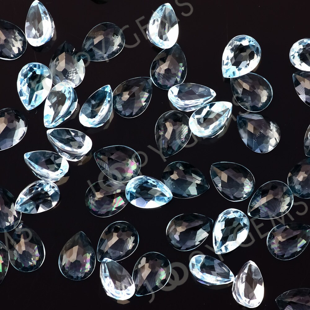 Sky Blue Topaz Rose Cut Pear Cabochon 8x6mm - Per Stone Sky Blue Topaz Rose Cut Pear Cabochon 8x6mm - Per Stone