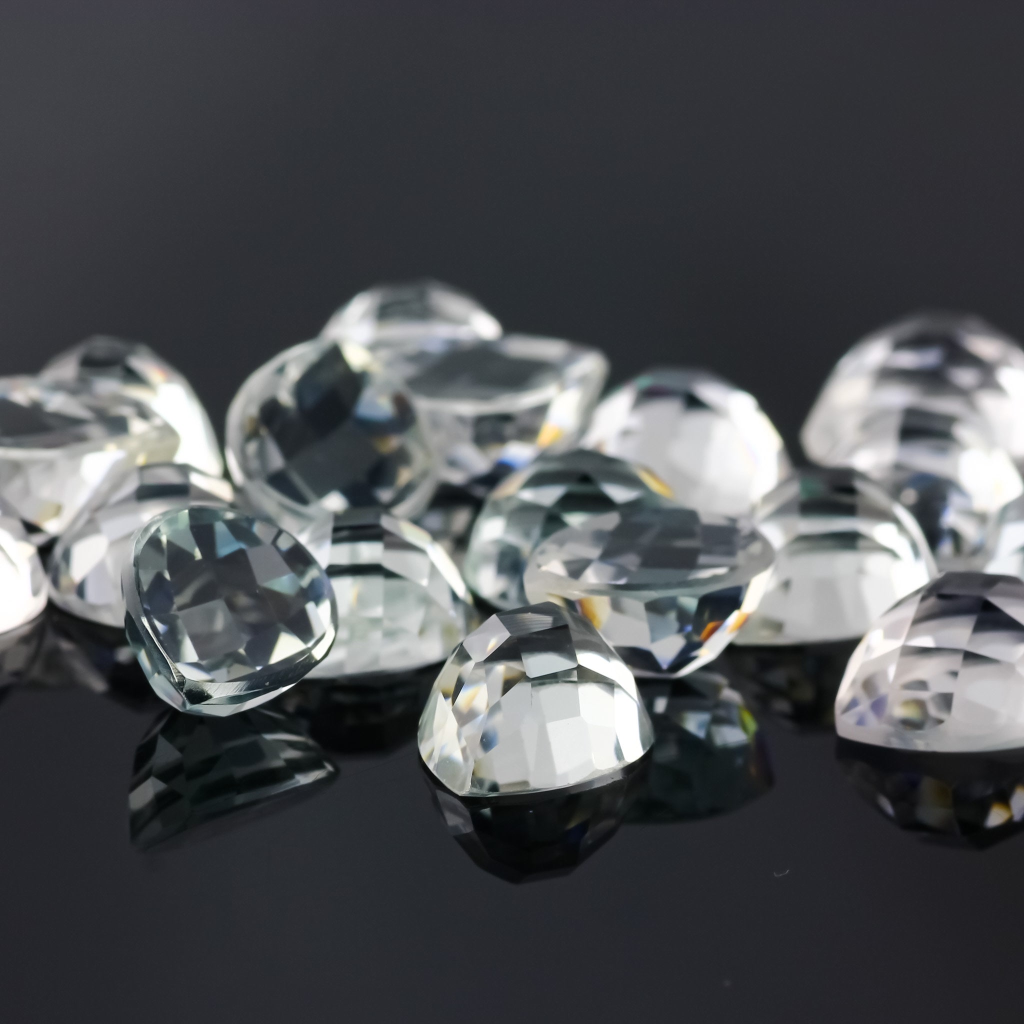 White Topaz Checker Faceted Pear Cabochon 10x12mm - Per Stone White Topaz Checker Faceted Pear Cabochon 10x12mm - Per Stone