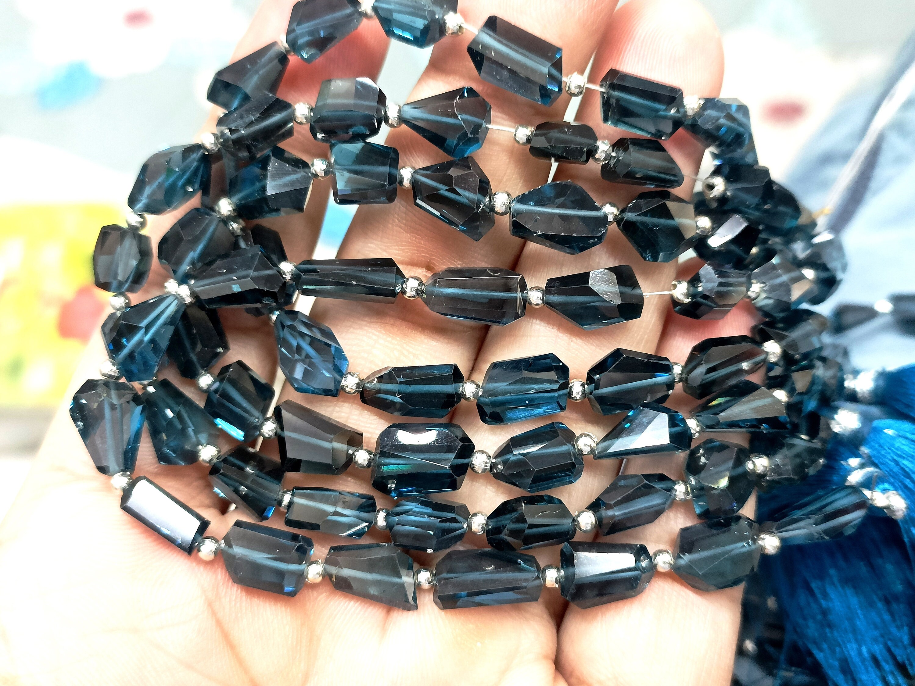 7 Inches Strand, Natural London Blue Topaz Faceted Nuggets Shape, Size 10-12mm 7 Inches Strand, Natural London Blue Topaz Faceted Nuggets Shape, Size 10-12mm