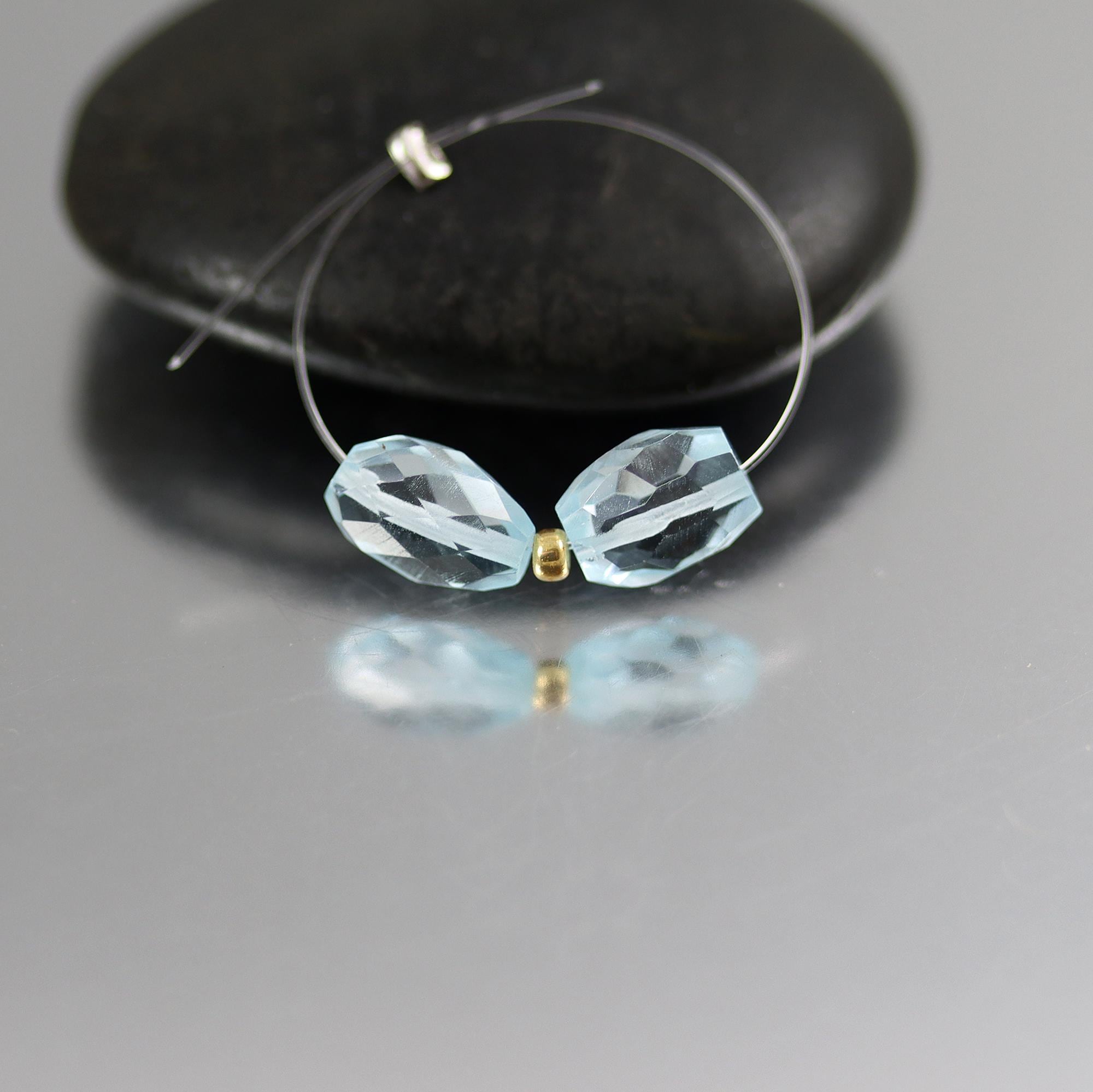 Faceted Sky Blue Topaz Nugget Beads - Pair - 9 X 6 Mm Faceted Sky Blue Topaz Nugget Beads - Pair - 9 X 6 Mm