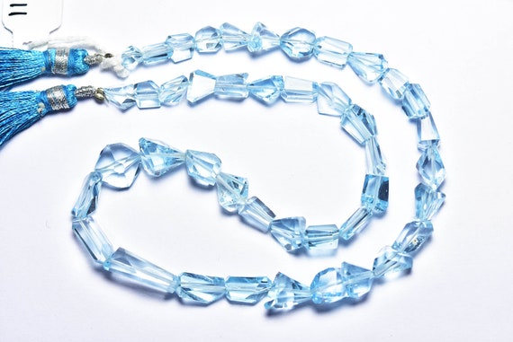 Super Quality Natural Blue Topaz Nugget Beads - 117 Carats - 14 Inches - Most Beauty Faceted Blue Topaz Nuggets - Size Is 6x7- 6x11mm #2338 Super Quality Natural Blue Topaz Nugget Beads - 117 Carats - 14 Inches - Most Beauty Faceted Blue Topaz Nuggets - Size Is 6x7- 6x11mm #2338