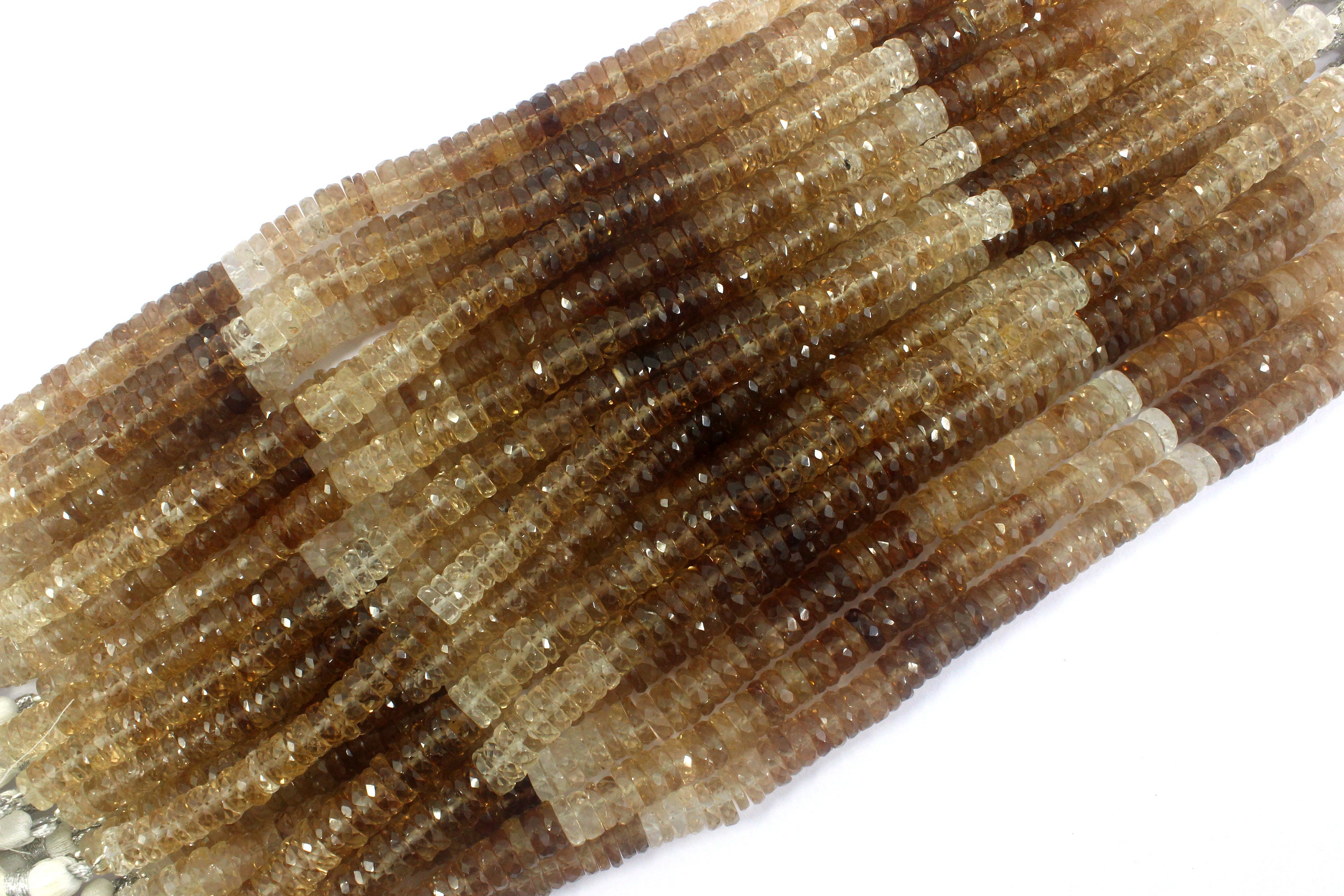 Imperial Topaz Gemstone Beads: 6-7mm Faceted Tyre Beads, 8" Strand Imperial Topaz Gemstone Beads: 6-7mm Faceted Tyre Beads, 8" Strand