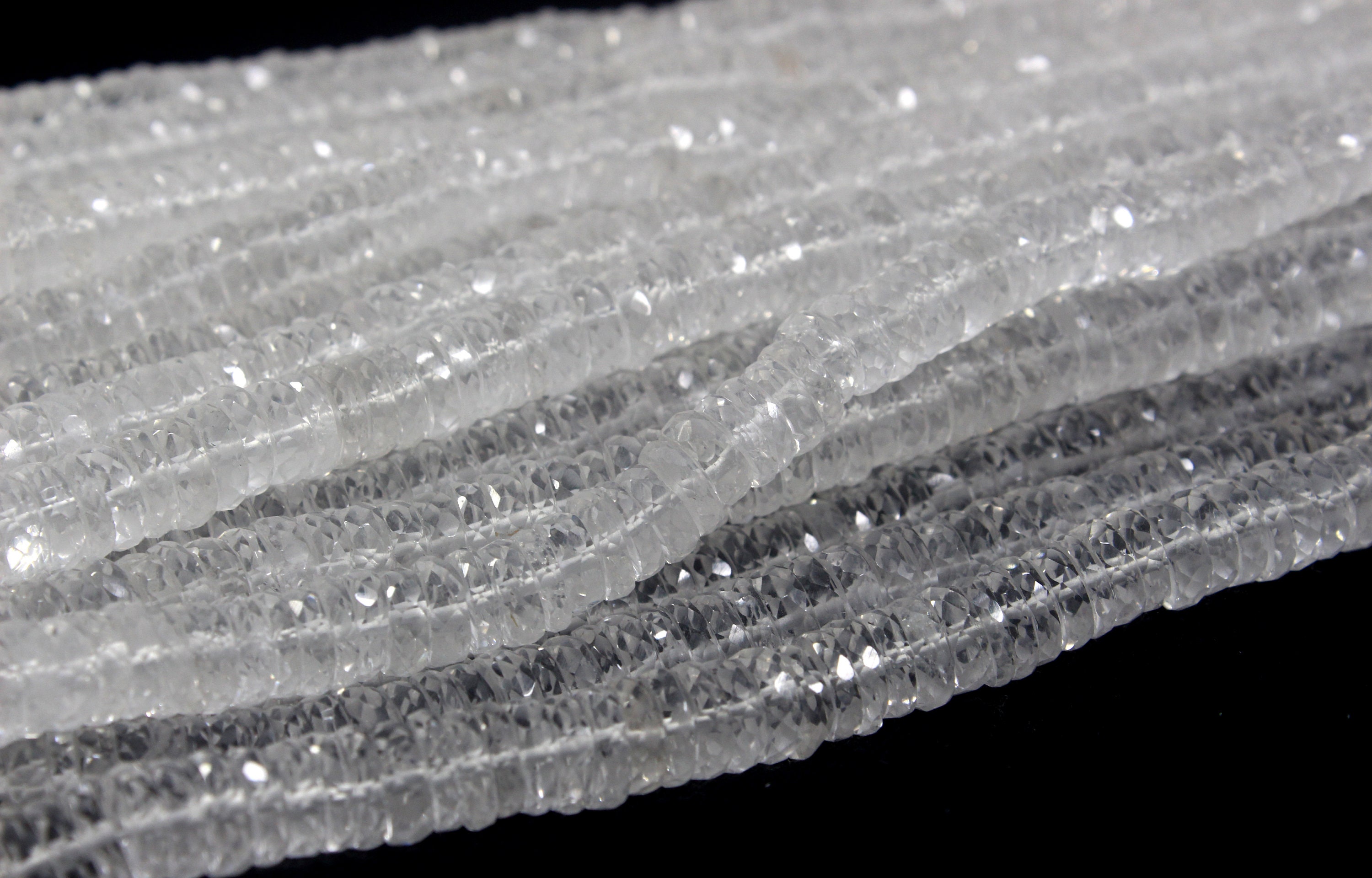 White Topaz Beads: 8" Strand Faceted Tyre, 7-8mm