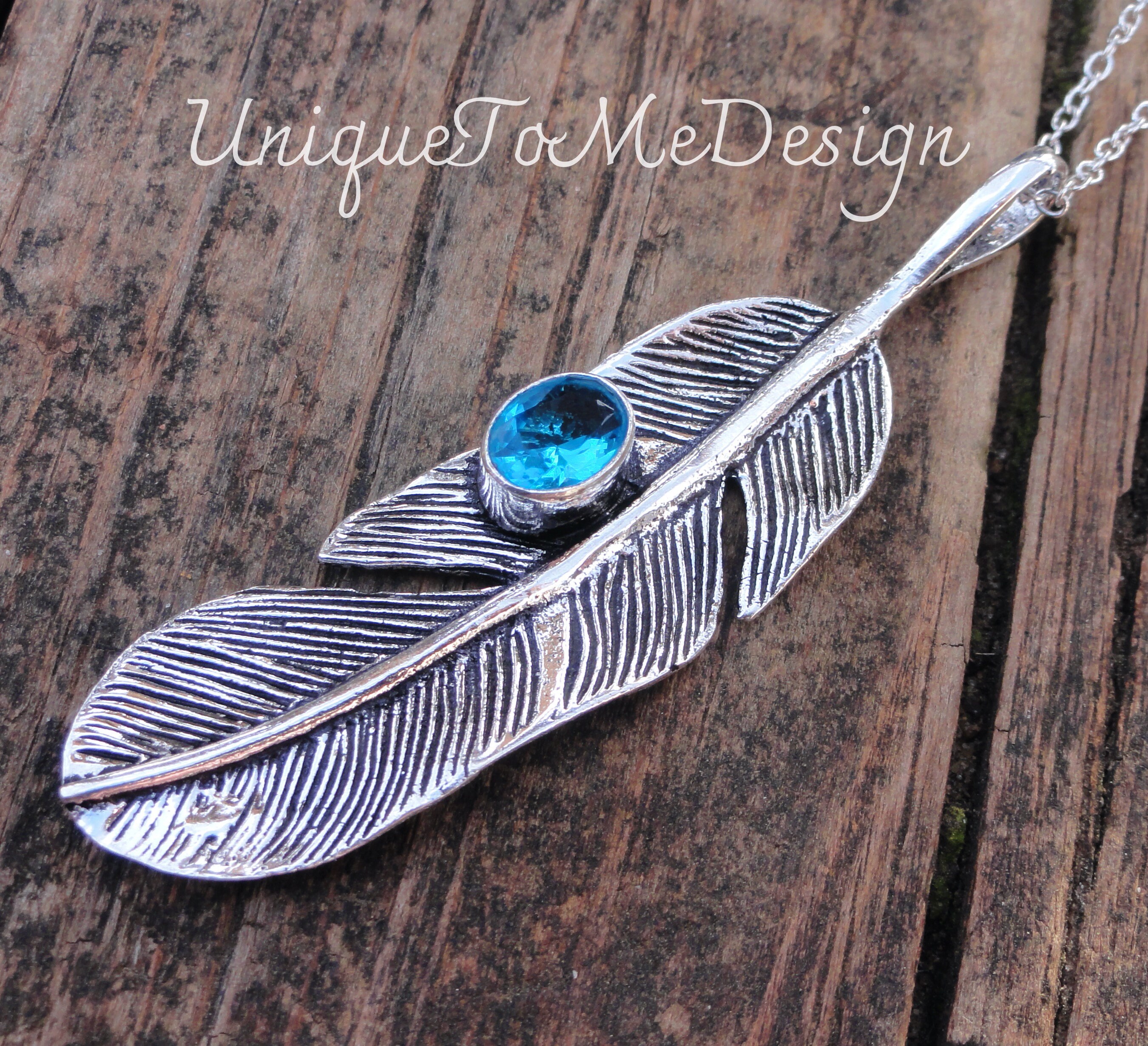 Handmade Sterling Silver Blue Topaz Feather Necklace