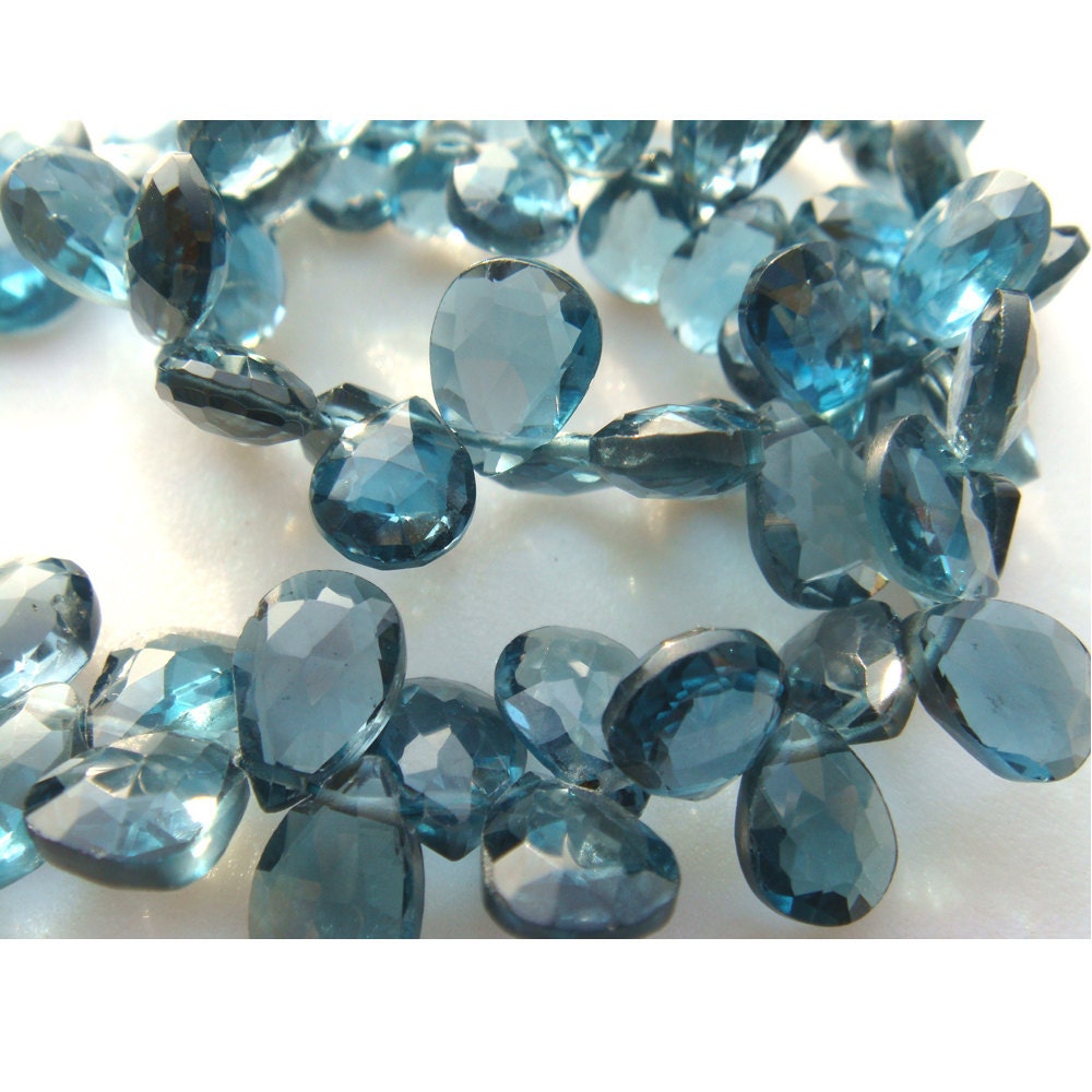 5x7mm London Blue Topaz Faceted Pear Shaped Briolettes, Blue Topaz Faceted Pear, London Blue Topaz For Jewelry (16pcs To 64pcs Options) 5x7mm London Blue Topaz Faceted Pear Shaped Briolettes, Blue Topaz Faceted Pear, London Blue Topaz For Jewelry (16pcs To 64pcs Options)
