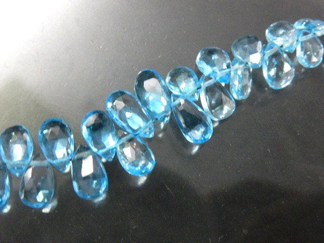 Blue Swiss Topaz Loose Gemstone Faceted Briolette Beads Size- 5x7mm Approx. 25pc-8 Inches Blue Swiss Topaz Loose Gemstone Faceted Briolette Beads Size- 5x7mm Approx. 25pc-8 Inches