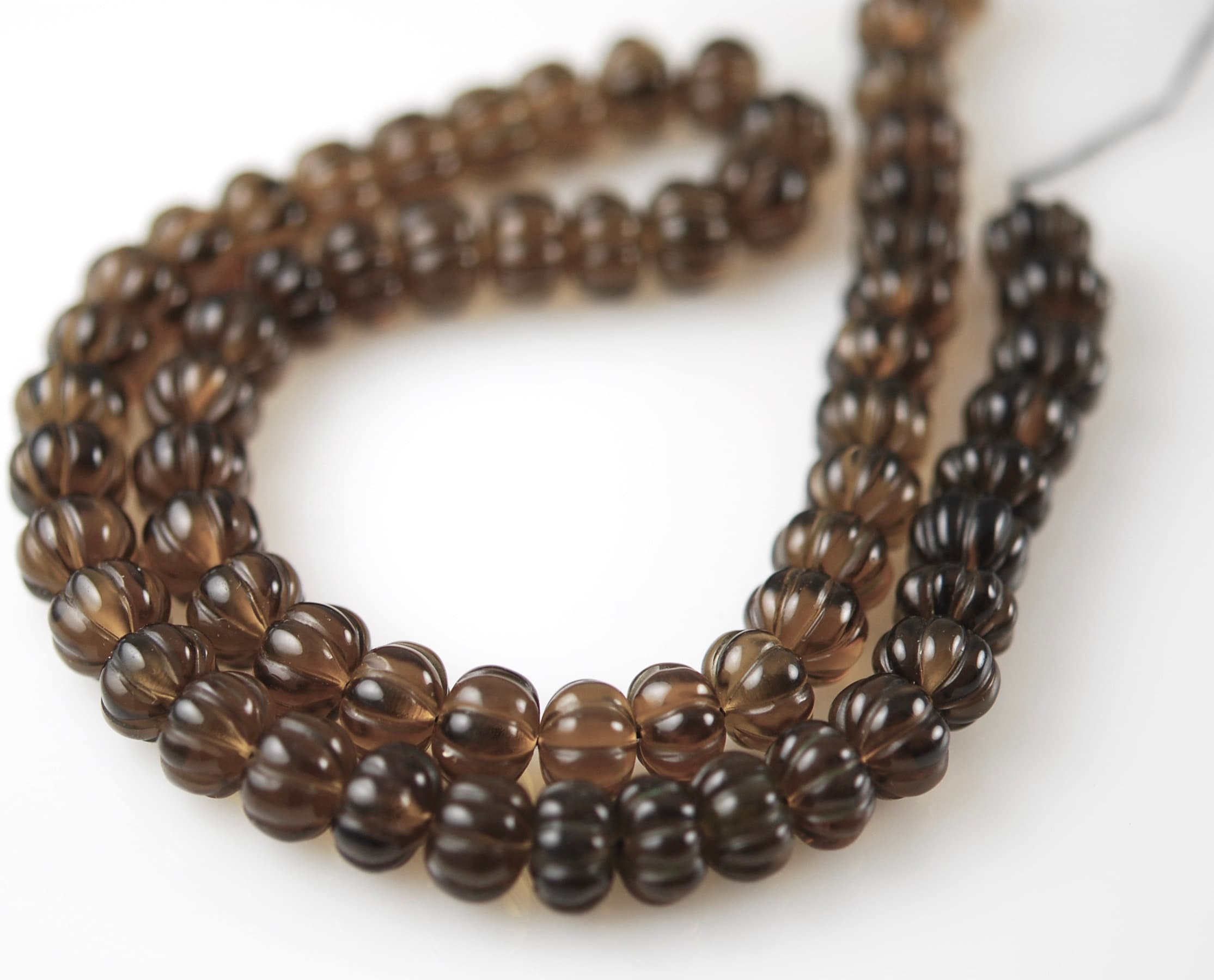 Smooth Clear Smokey Topaz Carved Beads