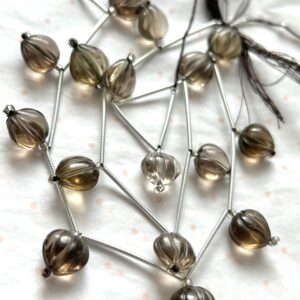 Smooth Smokey Topaz Carved Heart Shaped Beads Smooth Smokey Topaz Carved Heart Shaped Beads