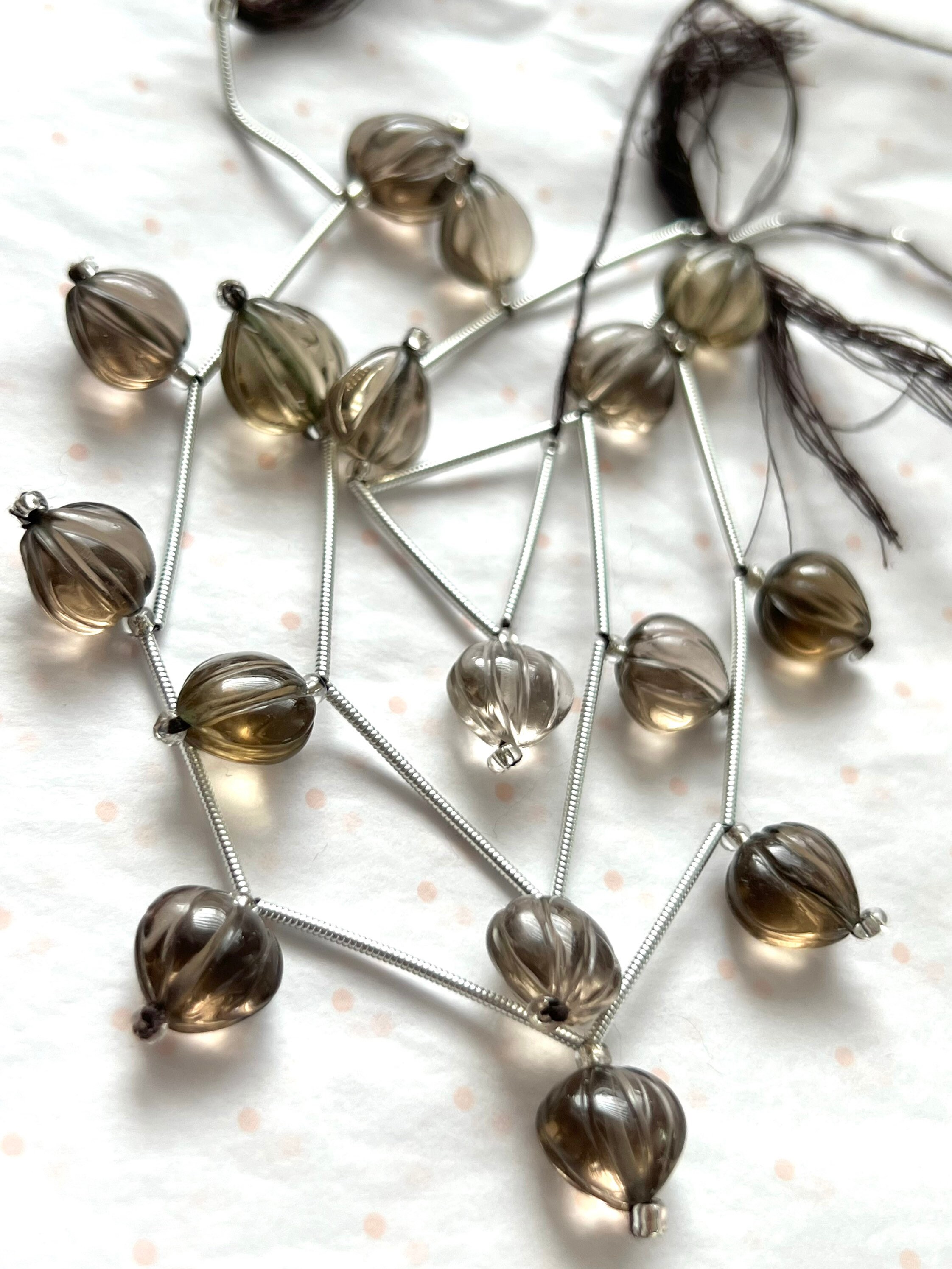Smooth Smokey Topaz Carved Heart Shaped Beads Smooth Smokey Topaz Carved Heart Shaped Beads