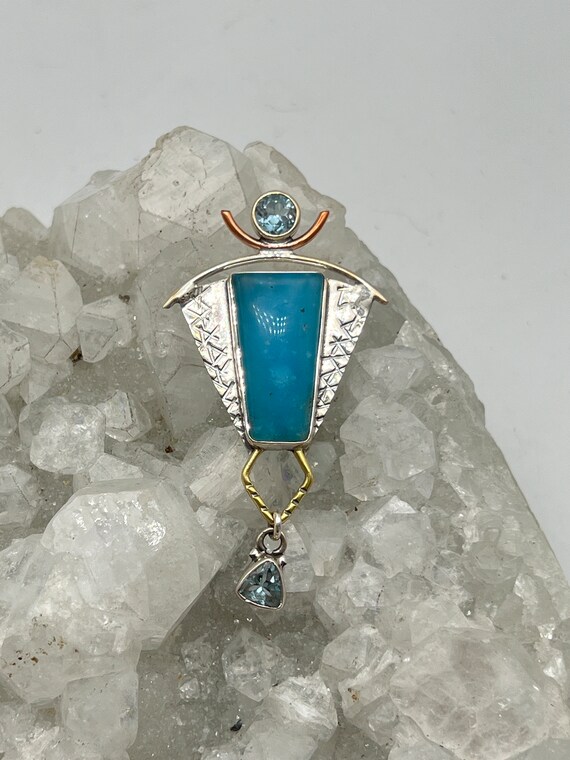 Abstract Smithsonite And Blue Topaz Pendant Abstract Smithsonite And Blue Topaz Pendant
