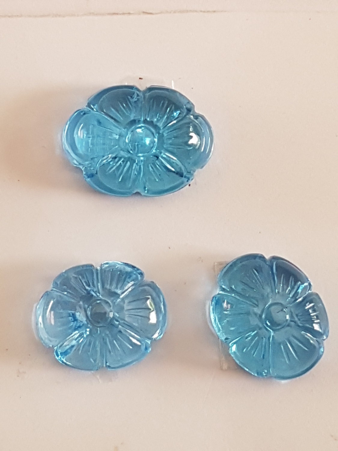 3 Pieces Of Sky Blue Topaz Ovals Cabs With Carving