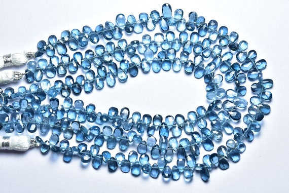 Superb London Blue Topaz - 9 Inches - Super High Quality Natural Faceted London Blue Topaz Pear Briolettes - Size Is 4x5.5-4x6.5mm #988 Superb London Blue Topaz - 9 Inches - Super High Quality Natural Faceted London Blue Topaz Pear Briolettes - Size Is 4x5.5-4x6.5mm #988