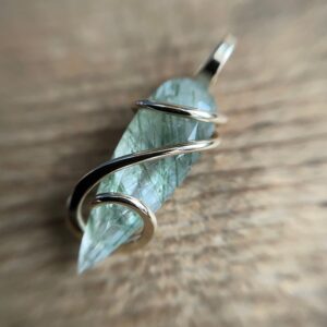 Faceted tourmalinated quartz in 14k gold pendant