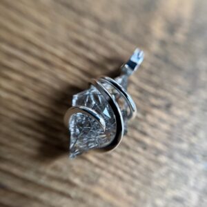 Faceted tourmalinated quartz in sterling silver pendant