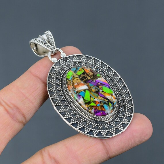 Kingman Turquoise Sterling Silver Pendant: Red Mohave Copper Gemstone