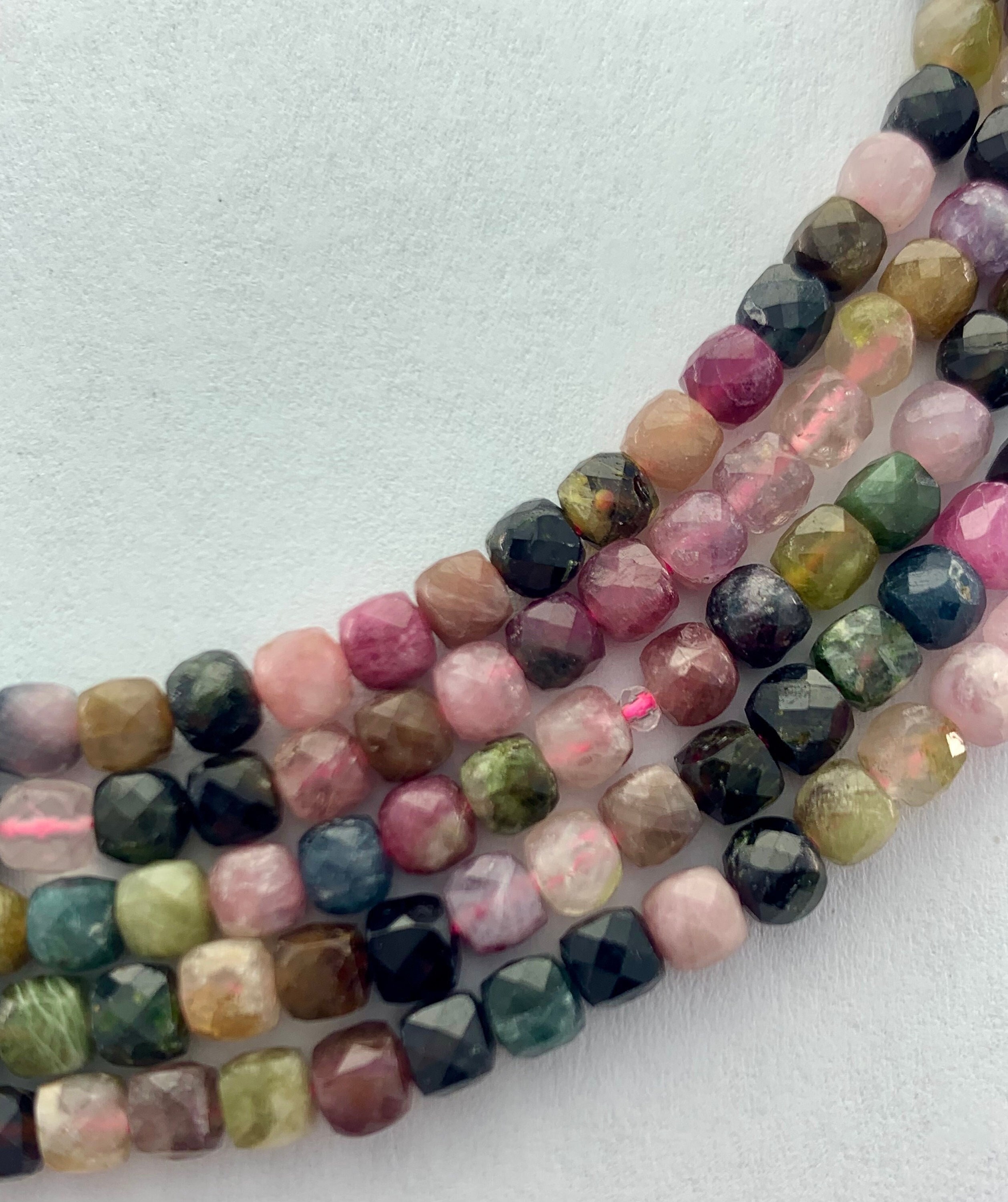 4mm Watermelon Tourmaline Precision Faceted Cube Gemstone Beads. 15" Strands Of High Quality Faceted Cubes, Approximately 86 Per Strand. 4mm Watermelon Tourmaline Precision Faceted Cube Gemstone Beads. 15" Strands Of High Quality Faceted Cubes, Approximately 86 Per Strand.