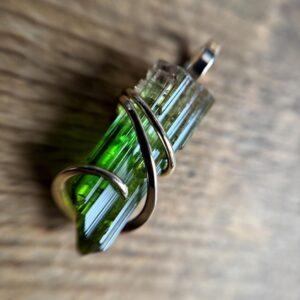Watermelon tourmaline crystal in 14k gold pendant