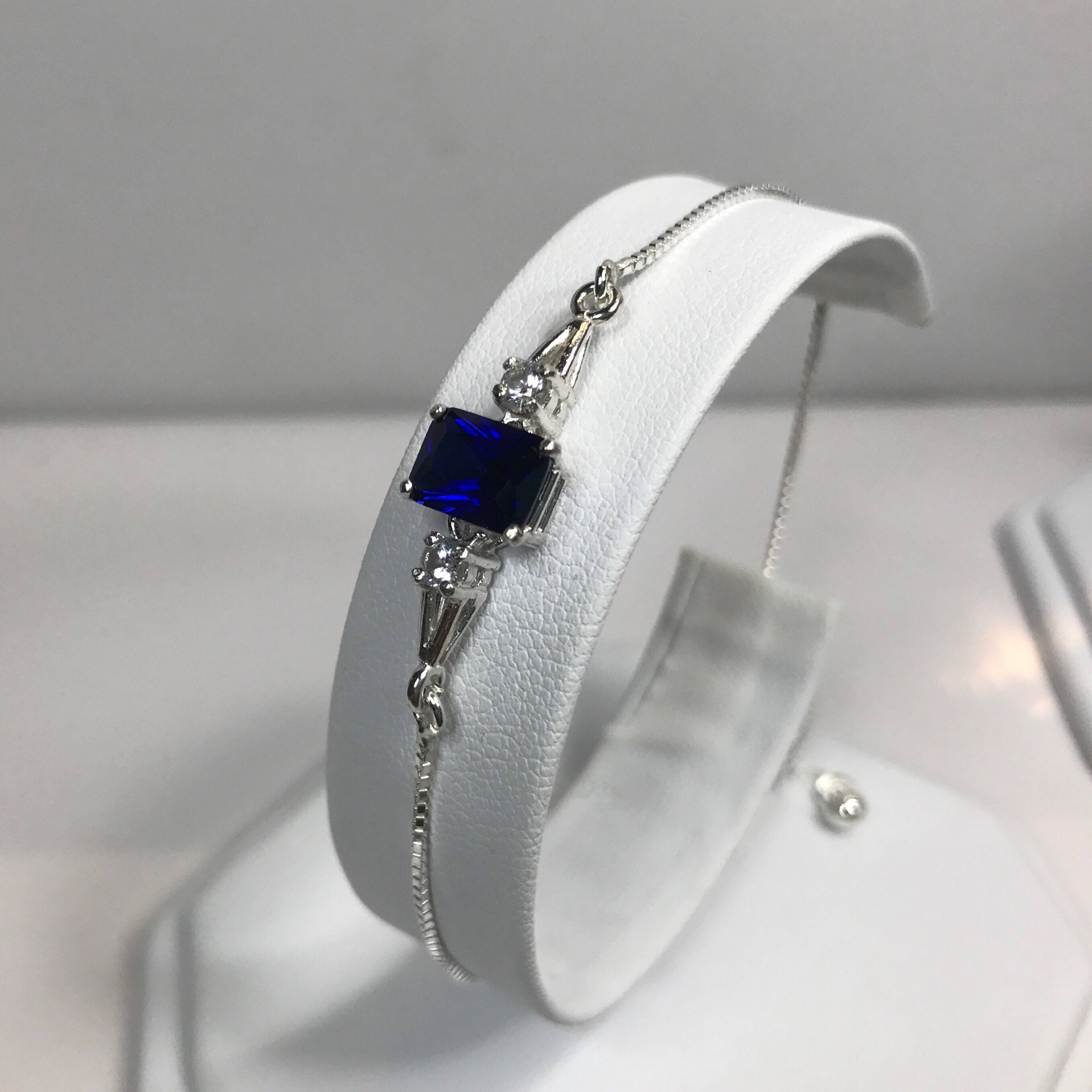 2ct Emerald Cut Sapphire Bolo Bracelet: Sterling Silver, White Sapphire Accents